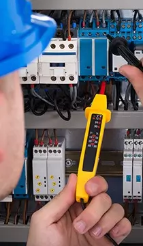 engineer inspecting door motor